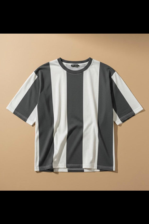 A short-sleeve crewneck t-shirt with vertical stripes in dark gray and off-white, displayed flat against a warm beige background. The brand logo 'SN GARMENT' is visible in the top-left corner.